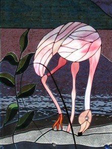 flamingo,s, eigen ontwerp, combinatie met tiffany. Glas omvat met koperfolie en daarna aan elkaar gesoldeerd.